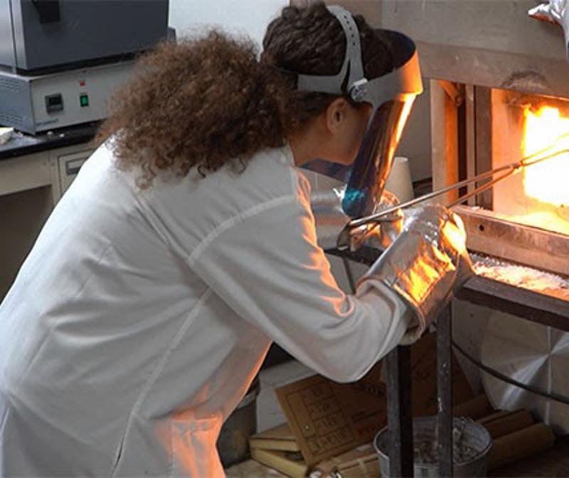 image of woman preparing glass